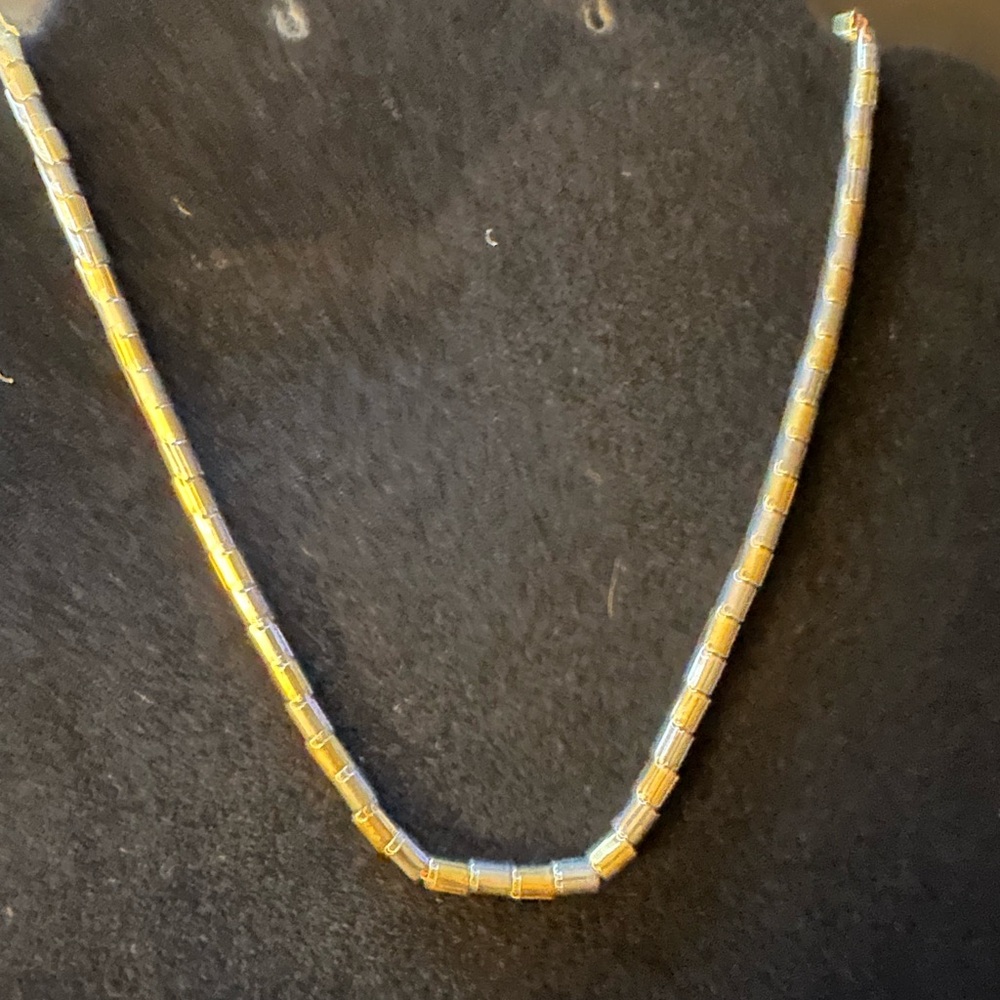 Elegant Gold and Silver Necklace